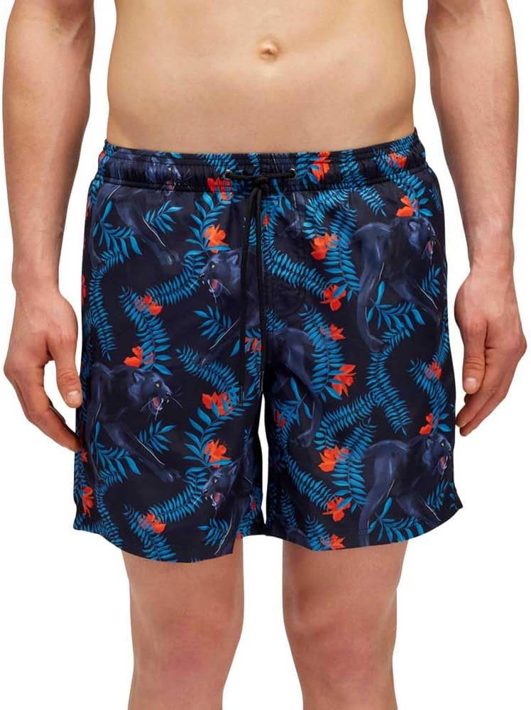 Pavo Monitor Arm installed on a wooden desk with cables organized