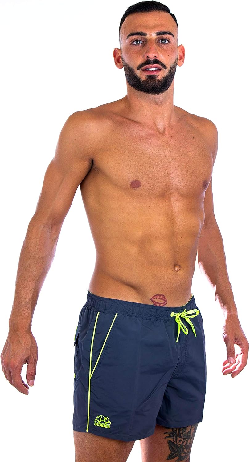 Pavo Monitor Arm installed on a modern desk with adjustable height