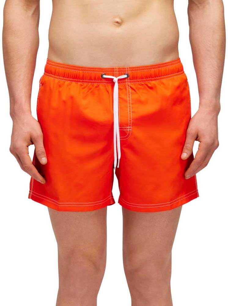 Pavo Monitor Arm installed on a wooden desk showing adjustable angles