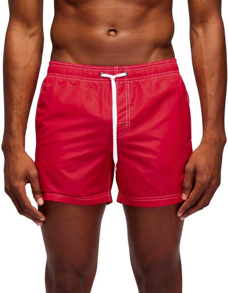 Pavo Monitor Arm installed on a wooden desk with monitor adjusted to eye level