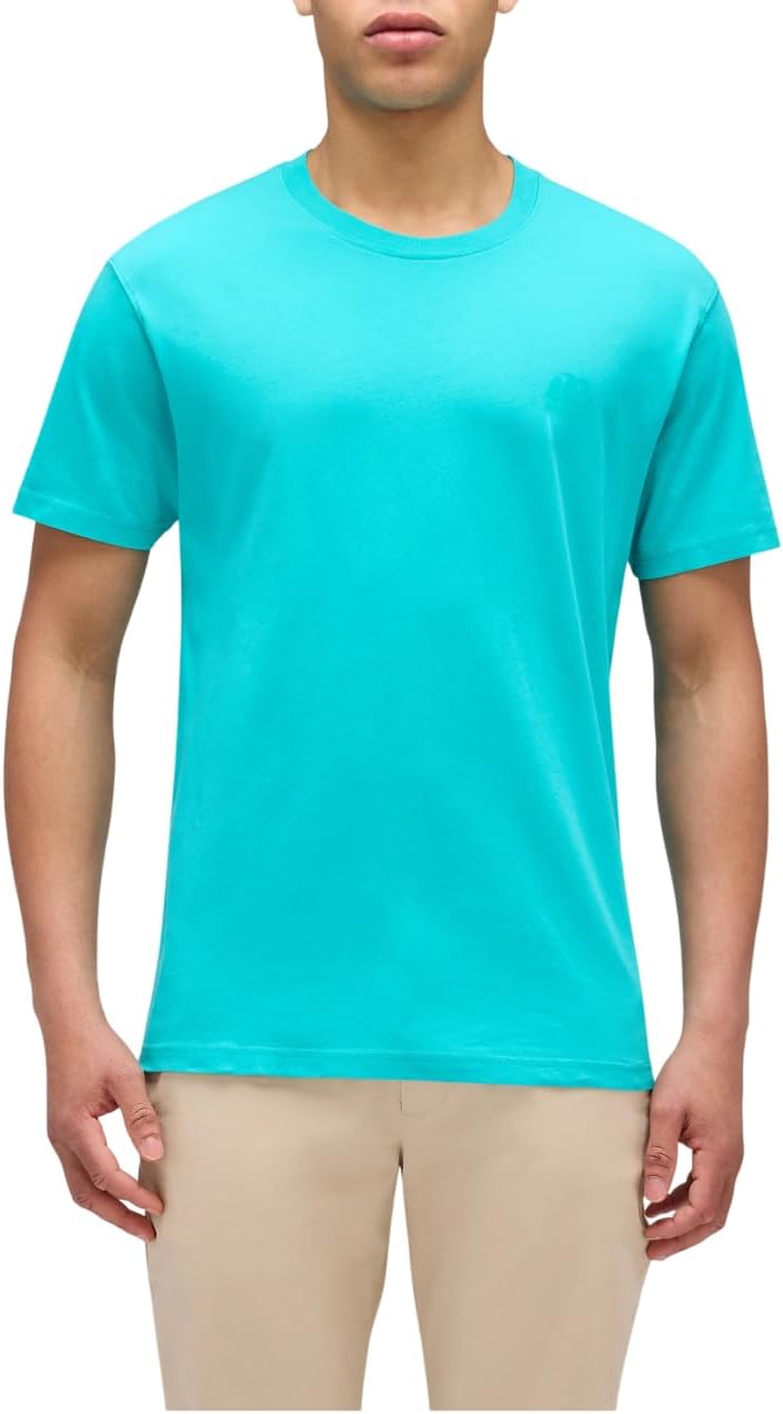 Pavo Monitor Arm installed on a wooden desk with monitor adjusted for viewing